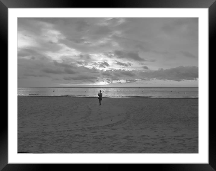 Contemplation at sunset in Borneo Framed Mounted Print by colin chalkley