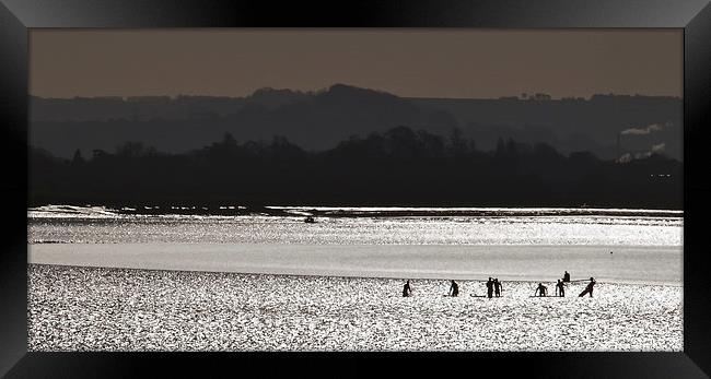 Surfers on Severn Bore Framed Print by mark humpage