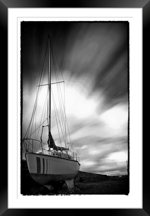Boat on the harbor Framed Mounted Print by Andrew chittock
