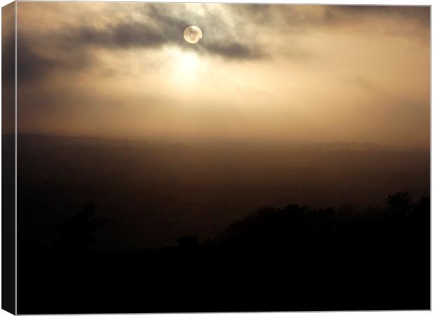 Sunset through the mist Canvas Print by Graham Heath