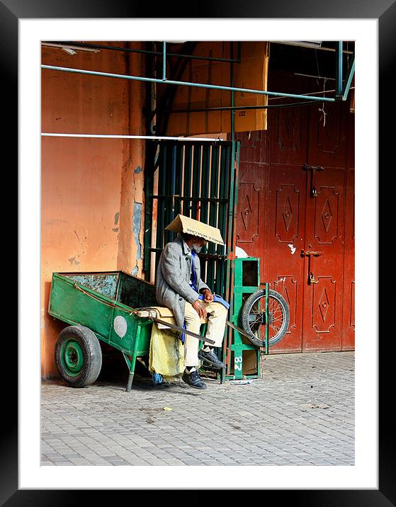 old man sheltering from the sun Framed Mounted Print by jon betts