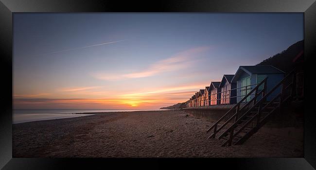 Beach Huts at Dawn Framed Print by Simon Wrigglesworth