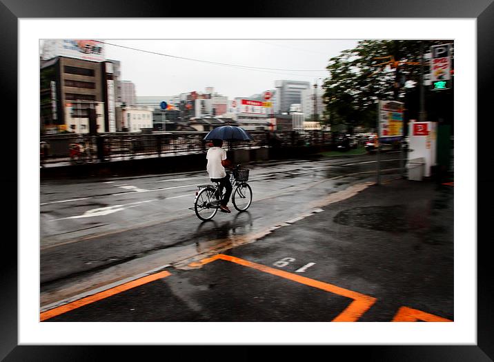 cyclist in rain Framed Mounted Print by david harding