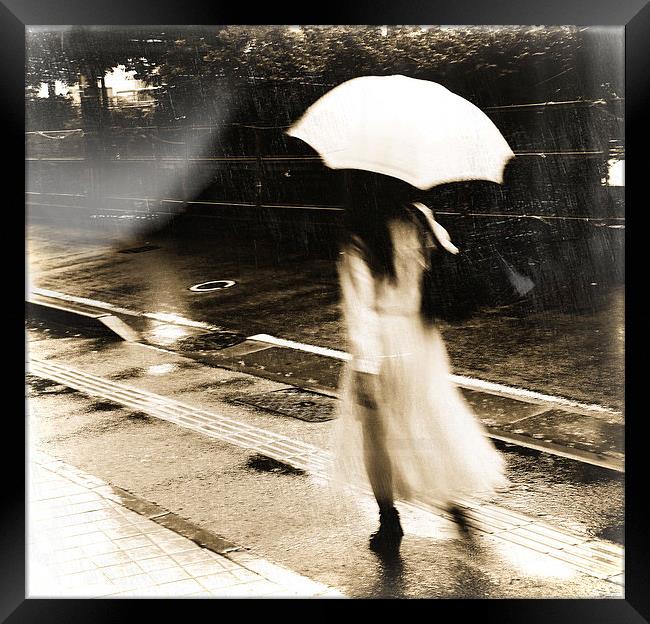 girl in rain Framed Print by david harding