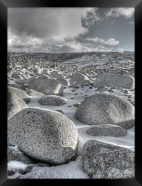 Boulders in the snow ! Framed Print by Peter Mclardy