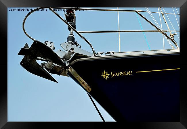 A yachts bow against a blue sky Framed Print by Frank Irwin