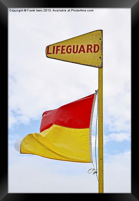 A beach Lifeguard flag Framed Print by Frank Irwin