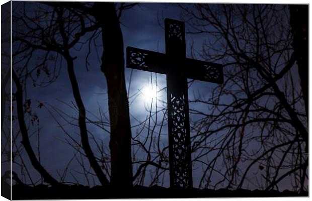 Cross on cemetery fence Canvas Print by Robert Parma