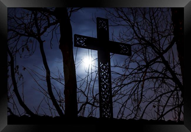 Cross on cemetery fence Framed Print by Robert Parma