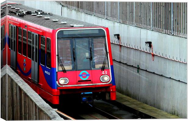 The DLR at City Airport Canvas Print by Robert Cane