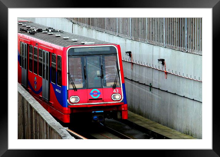 The DLR at City Airport Framed Mounted Print by Robert Cane