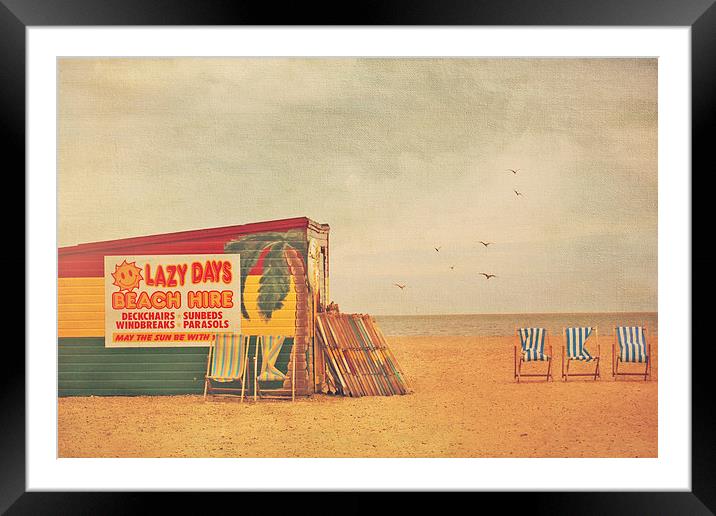 Deckchairs for hire Framed Mounted Print by Lesley Mohamad