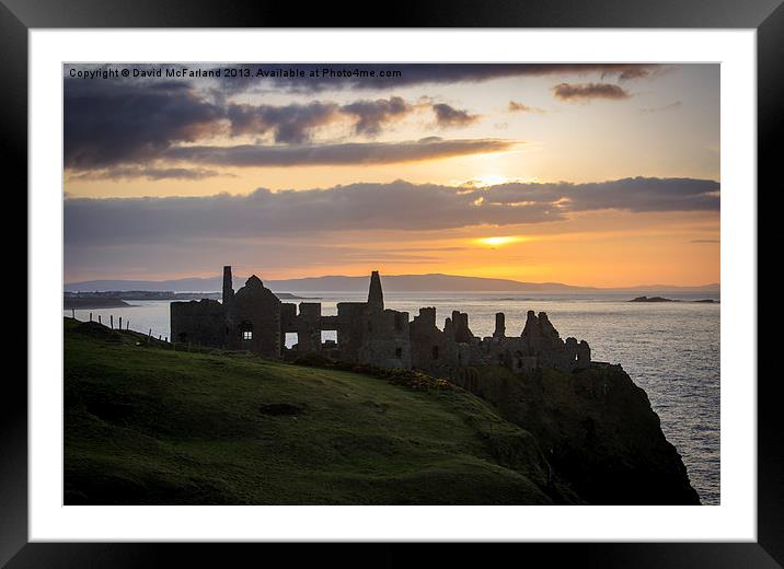 Sunset over Dunluce Castle Framed Mounted Print by David McFarland