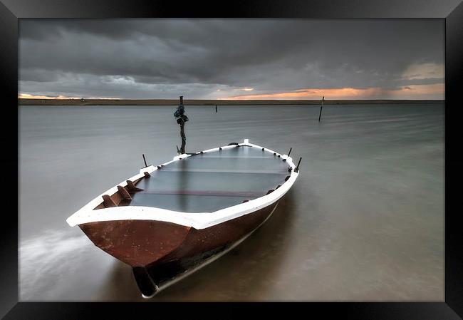 Run aground at Chesil Framed Print by Chris Frost