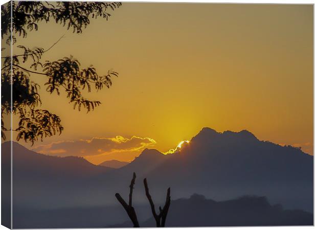 Laos Sunset Over the Mountain Canvas Print by colin chalkley
