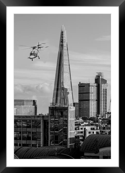 The Shard helicopter fly past Framed Mounted Print by Ian Jones