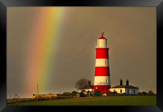 Lighthouse Under the Rainbow Framed Print by Simon Deacon