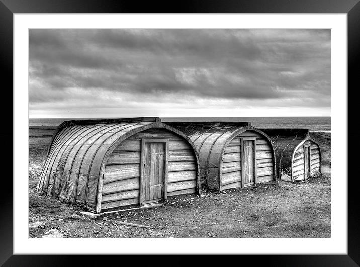 Lindisfarne Boat Huts Framed Mounted Print by Neil Young
