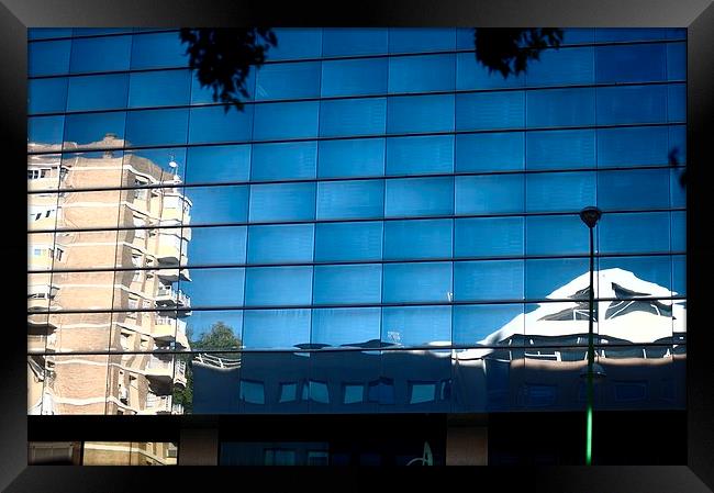 Reflection on a building Framed Print by Jose Manuel Espigares Garc