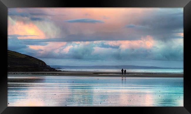 Sunset beach walk Framed Print by Simon West