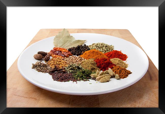 A plate of spices Framed Print by Dean Mitchell