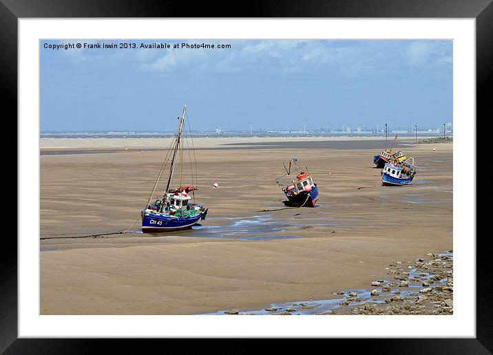 A row of small boats beached awaiting the incoming Framed Mounted Print by Frank Irwin