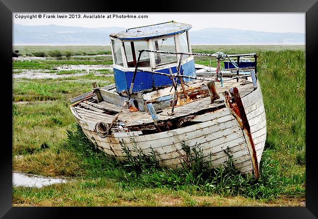 An abandoned and worse for wear boat Framed Print by Frank Irwin