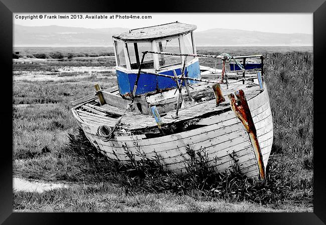 An abandoned and worse for wear boat Framed Print by Frank Irwin