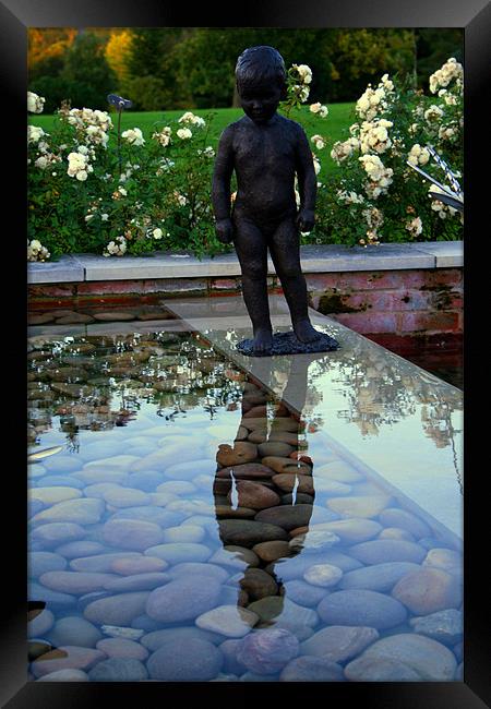 The boy in the water Framed Print by Nicholas Averre