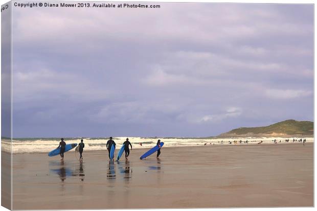 Woolacombe Beach Surfers Canvas Print by Diana Mower