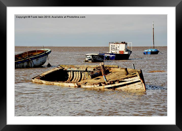 A number of abandoned and worse for wear boats Framed Mounted Print by Frank Irwin