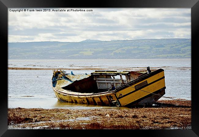 An abandoned and worse for wear boat Framed Print by Frank Irwin