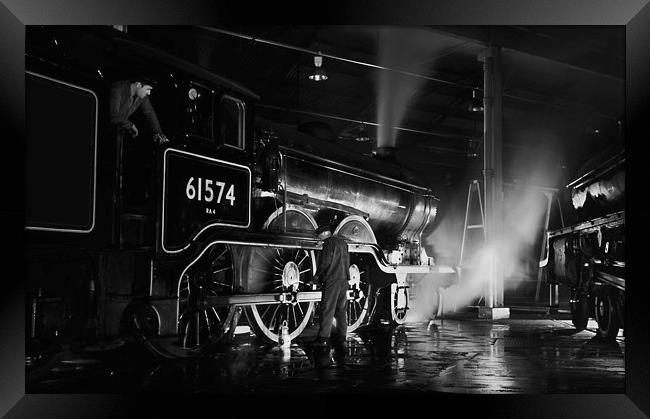 Oiling up a steam loco at night. Framed Print by Ian Duffield