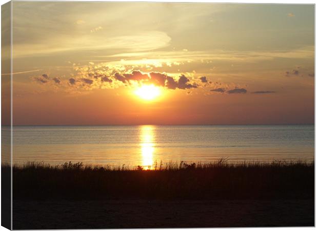 sunset over Lake Michigan Canvas Print by Emma Crowter