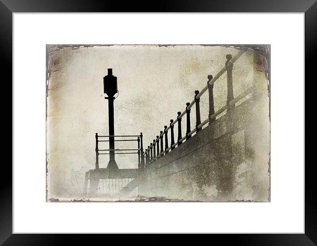 the pier in the fog Framed Print by Heather Newton