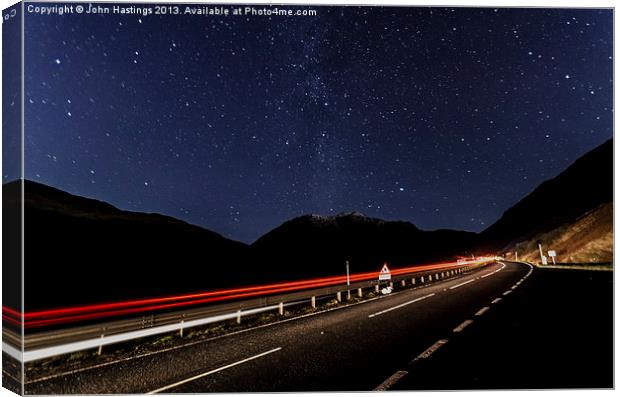 Milky Way over Argyll Canvas Print by John Hastings