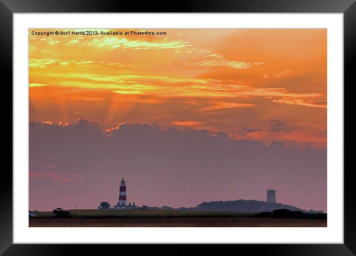 Sun rays over Happisburgh Framed Mounted Print by Avril Harris