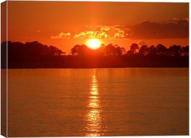 Why we love sunsets! Canvas Print by Jeffrey Evans