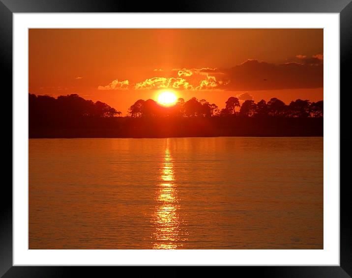 Why we love sunsets! Framed Mounted Print by Jeffrey Evans