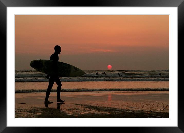 Silhouette of a surfer Framed Mounted Print by Helen Cooke