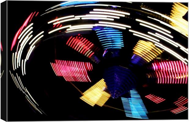 Spinning motion blur Canvas Print by Helen Cooke