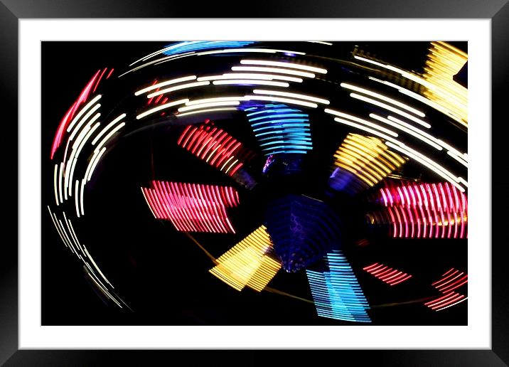 Spinning motion blur Framed Mounted Print by Helen Cooke