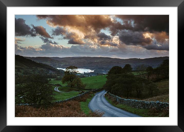 Steep mountain road 'the struggle' at sunset, with Lake Winderme Framed Mounted Print by Liam Grant