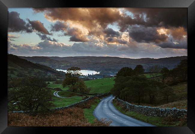 Steep mountain road 'the struggle' at sunset, with Lake Winderme Framed Print by Liam Grant