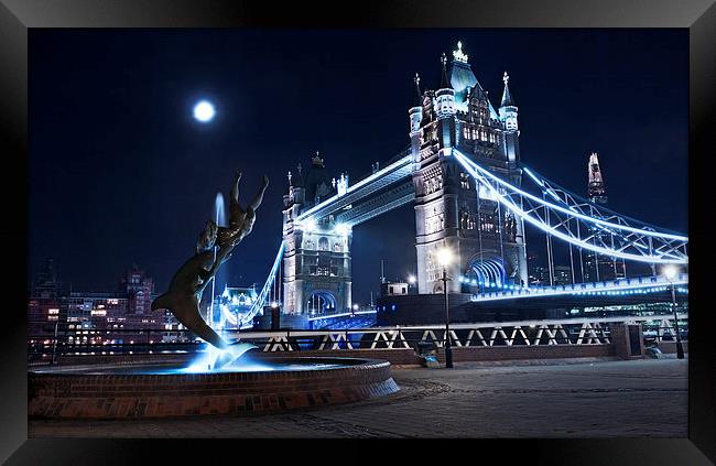 London Tower Bridge with dolphin statue Framed Print by John Ly