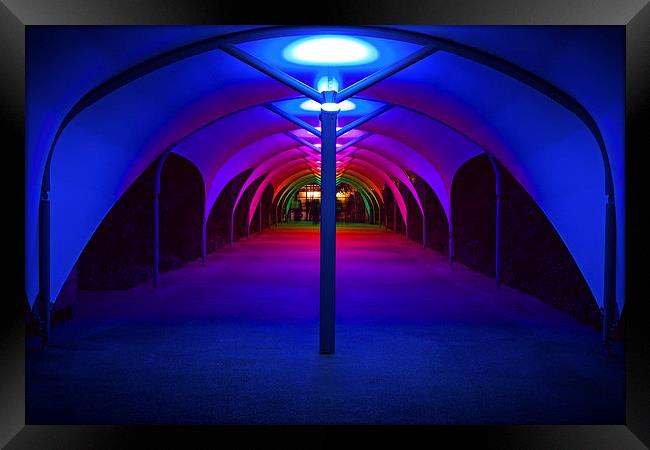 Tunnel to North Greenwich Pier - Blue Lights Framed Print by John Ly