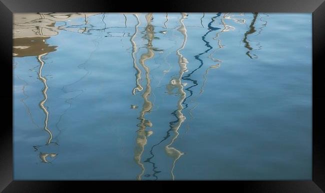 Yacht masts reflected Framed Print by Maggie Railton