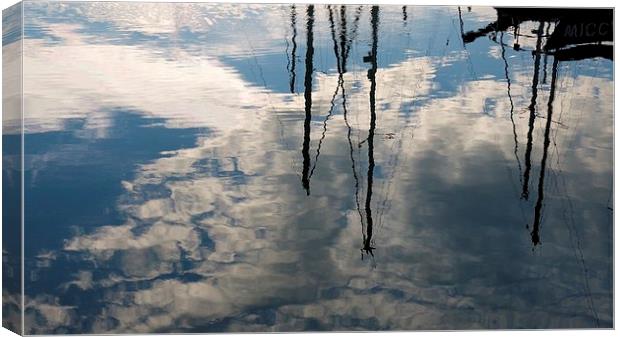 Masts reflected Canvas Print by Maggie Railton