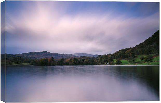 Clouds sweeping over Rydal Water at dusk. Canvas Print by Liam Grant