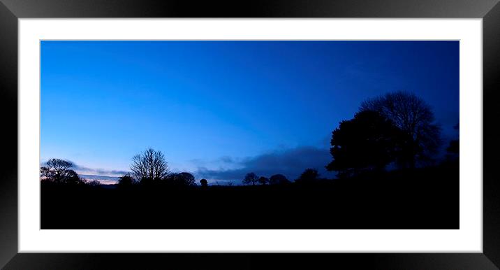 Dawn silhouette Framed Mounted Print by Neil Ravenscroft